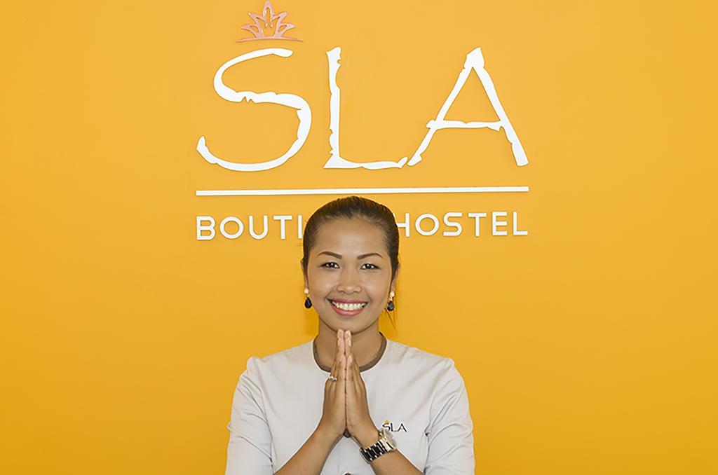 Sla Boutique Hostel Phnom Penh Bagian luar foto