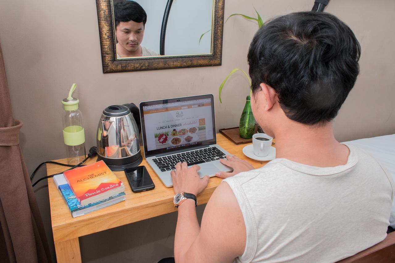 Sla Boutique Hostel Phnom Penh Bagian luar foto